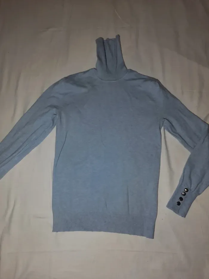 Pull col roulé