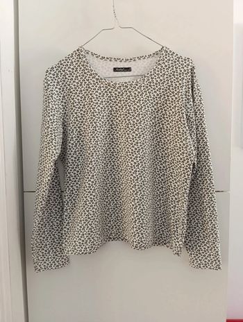 Top vintage léopard extensible taille 42 estimée