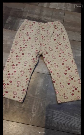 Pantalon crème fleur rouge