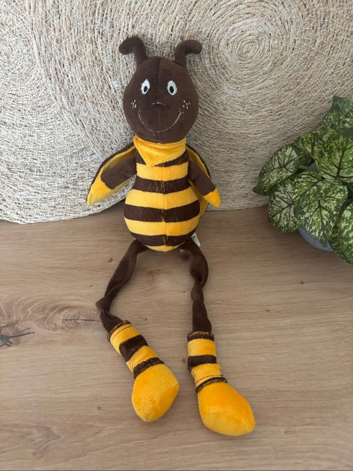 Doudou abeille jaune marron longues jambes les petites marie