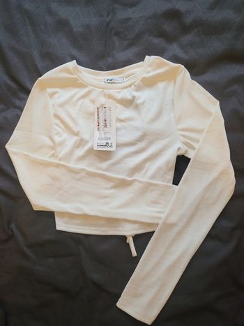 Haut court blanc manches longues taille L