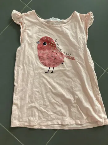 T shirt oiseau h&m 8-10 ans en très bon état