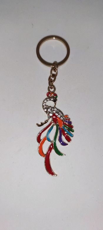 porte clé bijou métal doré paon multicolore