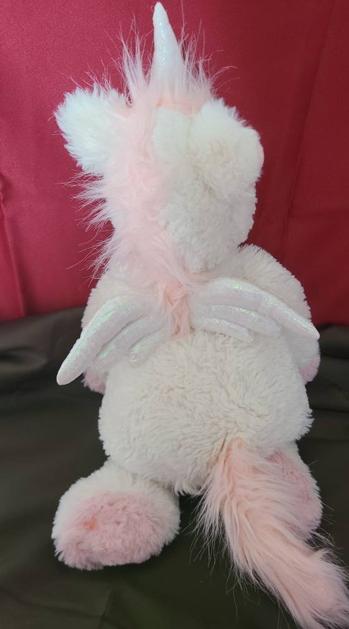 Peluche licorne ETAM range pyjama doudou bouillotte blanc rose ailes blanches 45 cm - photo numéro 3