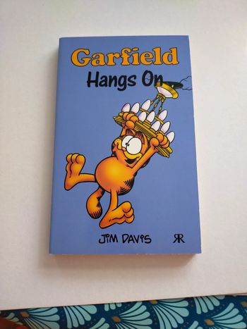 Garfield hangs on