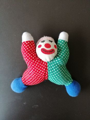 Doudou clown en bon état