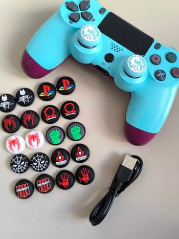 Manette PS4 neuve bleu ciel violet 