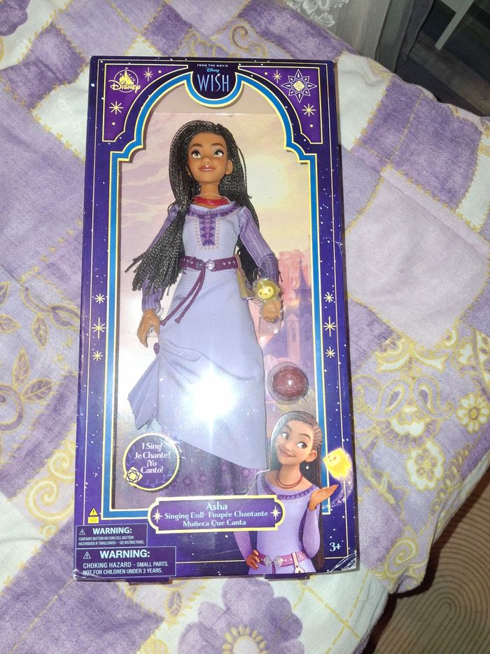 Poupée disney store singing Asha Wish