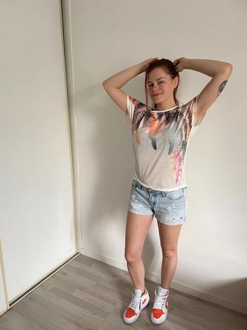 T-shirt motif plume