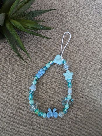 Lanière de telephone bleue neuve