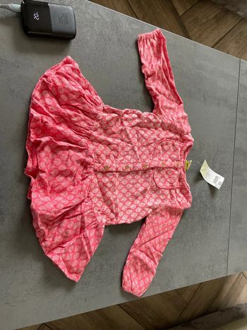 Tunique tape à l’œil neuf