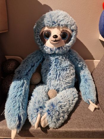 Peluche singe bleu
