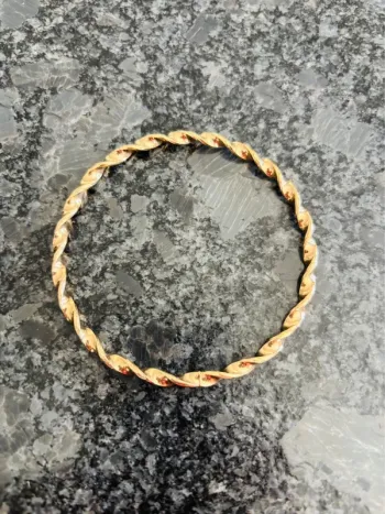 Magnifique bracelet fantaisie torsadé doré neuf