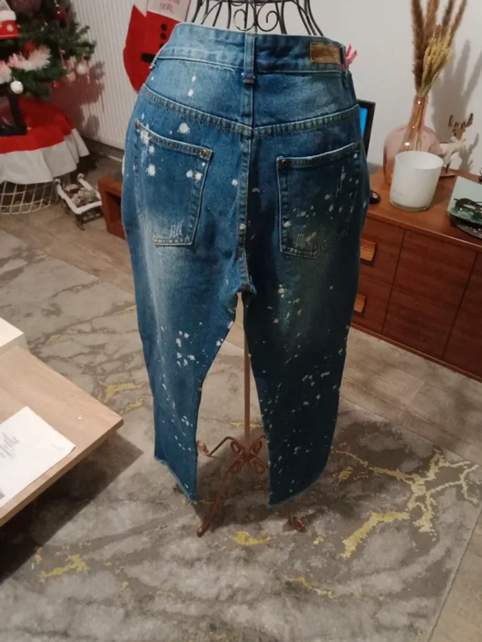Jeans bleu troué - photo numéro 9