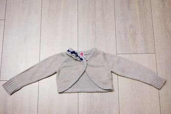 Gilet court gris brillant doré. 2 ans fille. Marque Orchestra