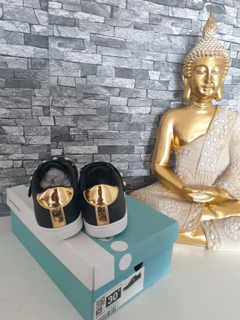 Baskets noir et doré pointure 36