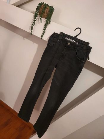 Jean skinny garçon Taille 14 ans en très bon état
