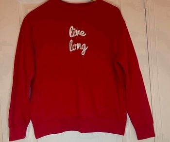 Pull rouge motif hiver