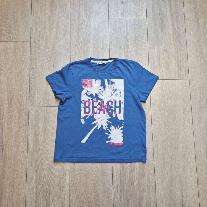 Tee-shirt bleu. Garçon 10/11 ans. Marque NPO