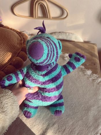 Peluche à rayure bleu et violet bouclette neuve