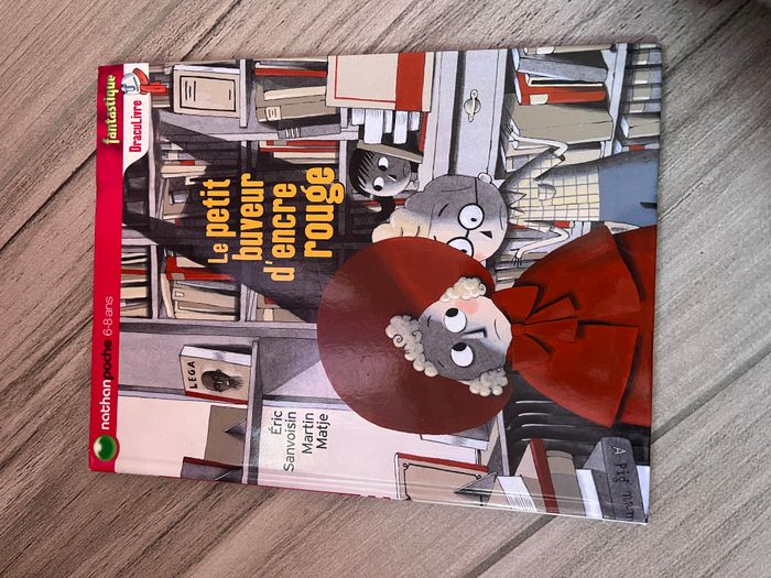 Le petit buveur d'encre rouge - photo numéro 1