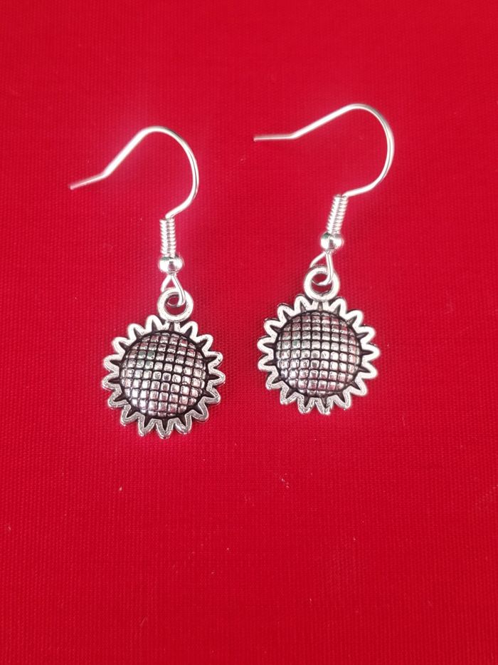 Boucles d'oreilles pendante argenté fleur de tournesol