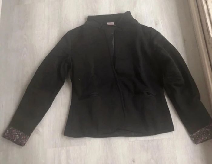 Veste 42/44 maque 3 suisses