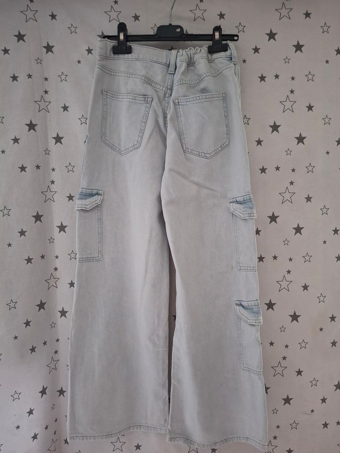 Jeans bleu clair cargo large réglable 12 ans H&M 
Très bon état - photo numéro 5