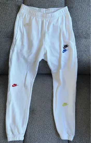 Jogging blanc logo multicolore Nike