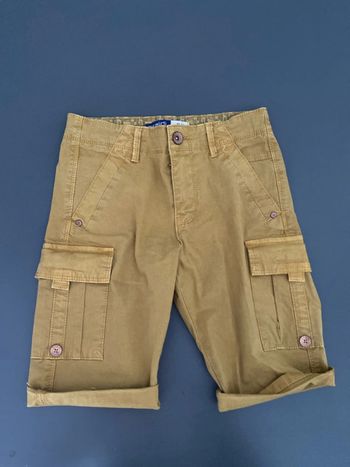 Short OKAIDI comme neuf 8 ans