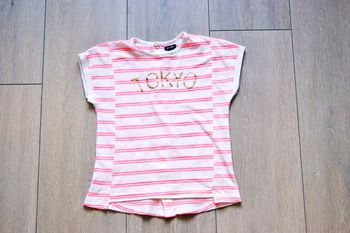Maillot manche courte blanc et rose fluo. 5 ans fille. Kiabi