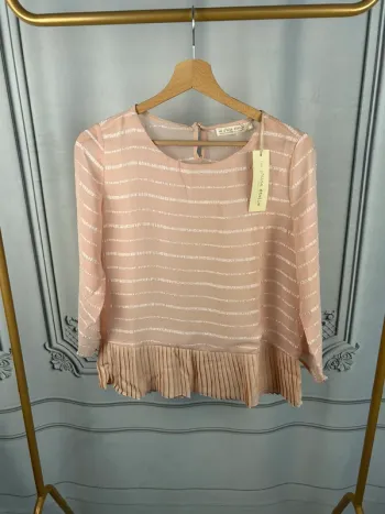 Blouse rose La P’tite étoile T1 / S neuve