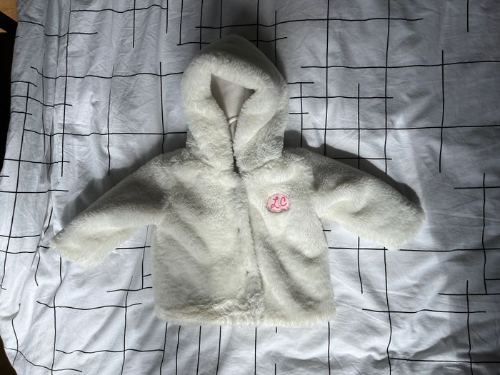 Manteau a capuche
