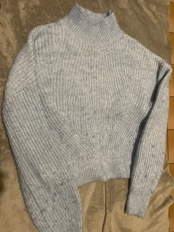 Pull col roulé