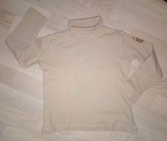 Sous-pull beige Kiabi
T. 8 ans