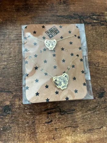 Bracelet et collier en acier avec tigre