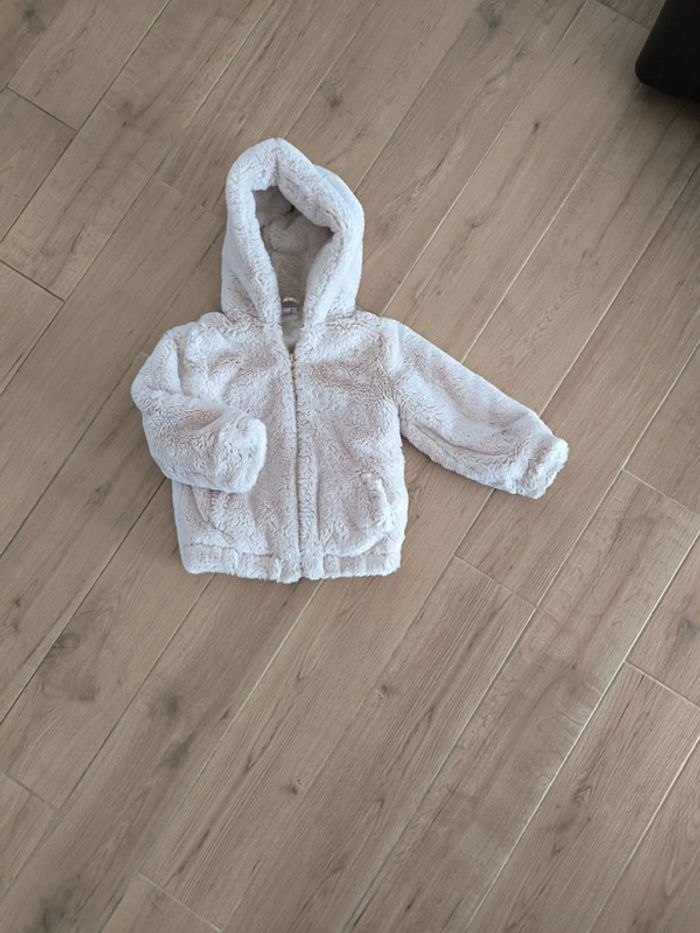 Manteau fourrure beige