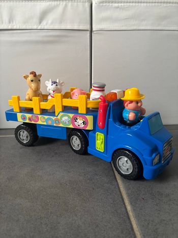 Camion de la ferme musicale bleu