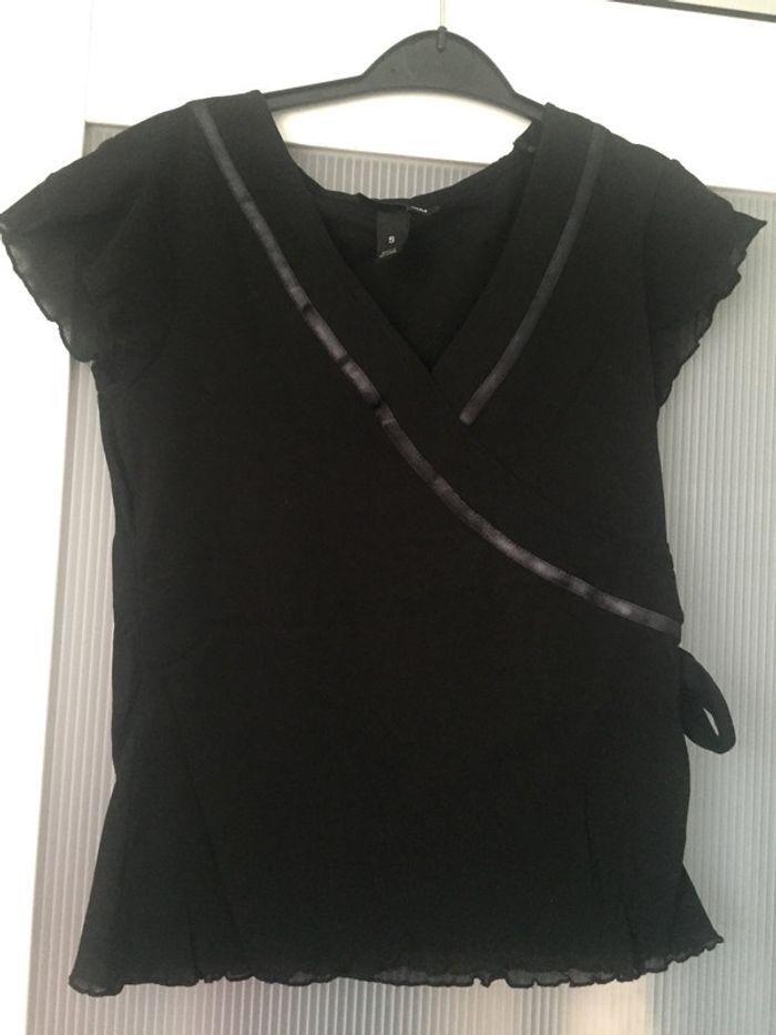 Blouse noire col V avec noeud sur le côté H&M