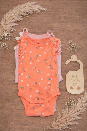 Lots de 4 bodys bébé  filles  taille 0-3 mois 