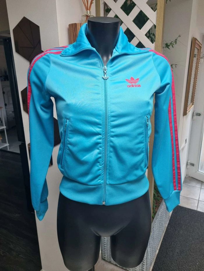 Veste de sport bleu turquoise et rose taille S