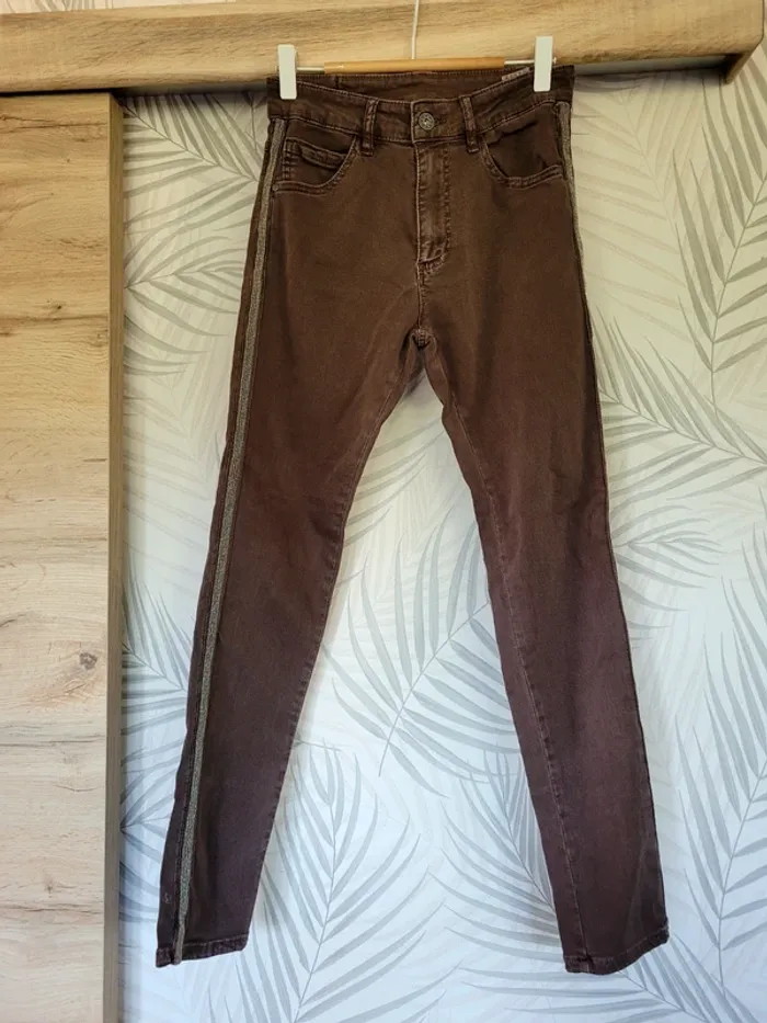Jean marron brillant sur le côté taille XS