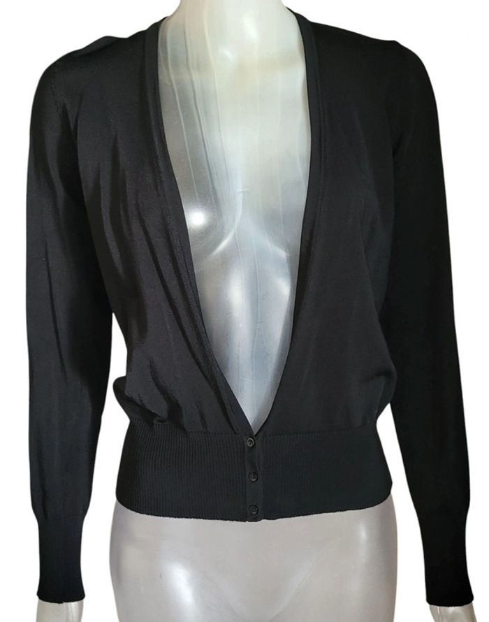 Magnifique matière pour ce pull gilet noir. 3 boutons. Côté femme neuf. M38/L40 🥰