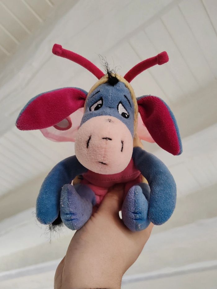 Peluche bourriquet papillon