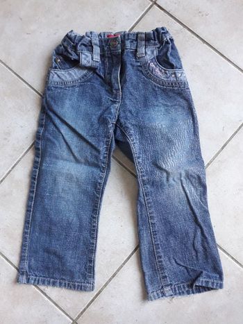 Jean avec strass et motif poche arrière