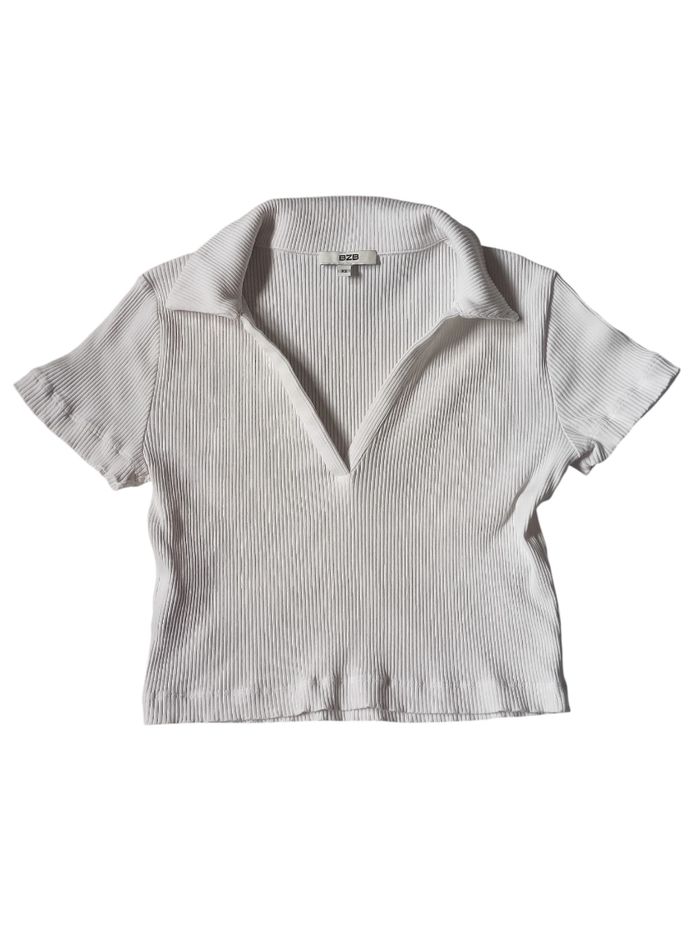 Polo court taille XS