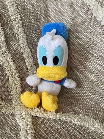 Peluche doudou 22cm Disney Donald canard blanc et bleu parfait état
