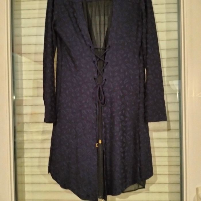 Gilet avec des détails de dentelle en très bon état