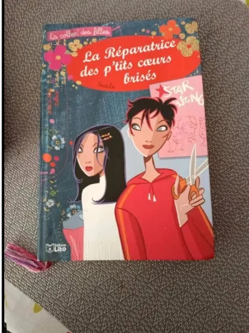 Livre  La réparatrice des p'tits coeurs  brises bon état