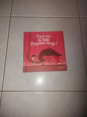 livre "il faut aider le petit chaperon rouge"